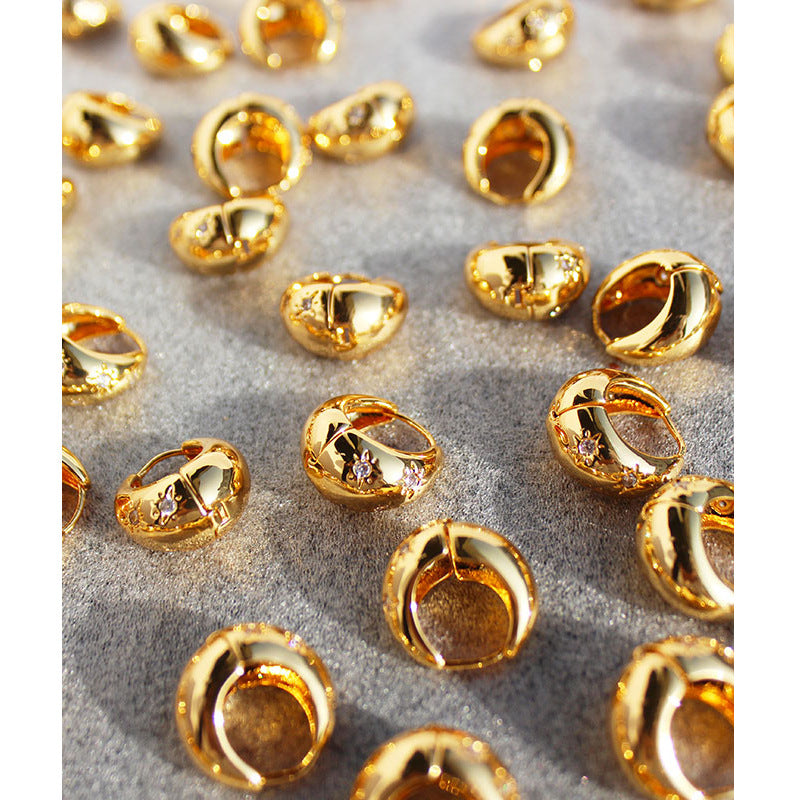 Starburst Zirconia water drop shaped earrings 18k gold plated.
