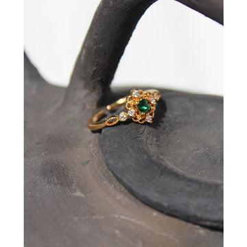 Medieval emerald gemstone inlaid zircon ring
